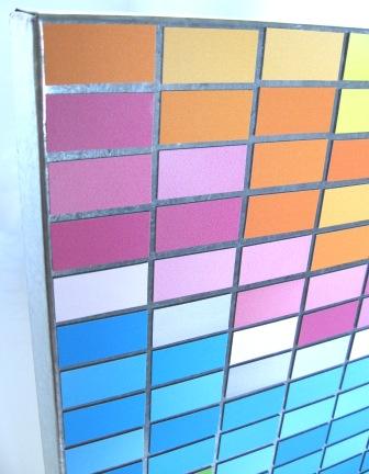 Another close up of the magnet art titled 'Weather'.